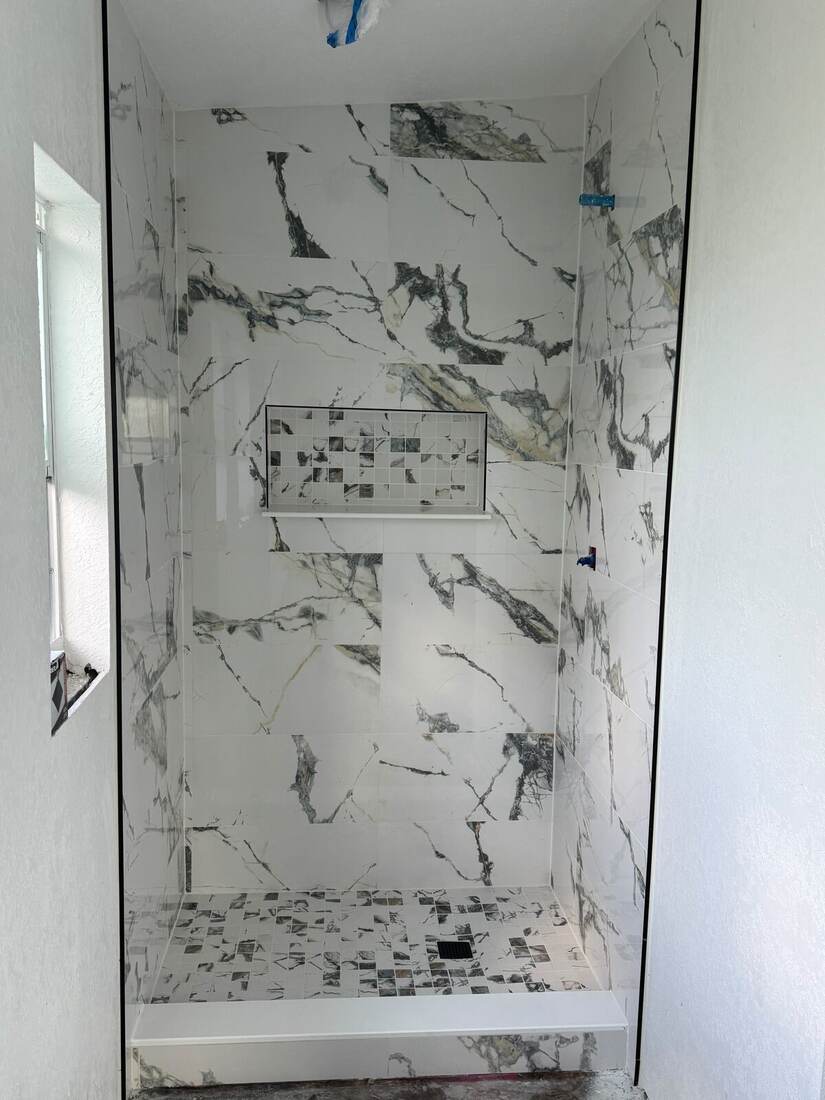 Book-matched marble shower